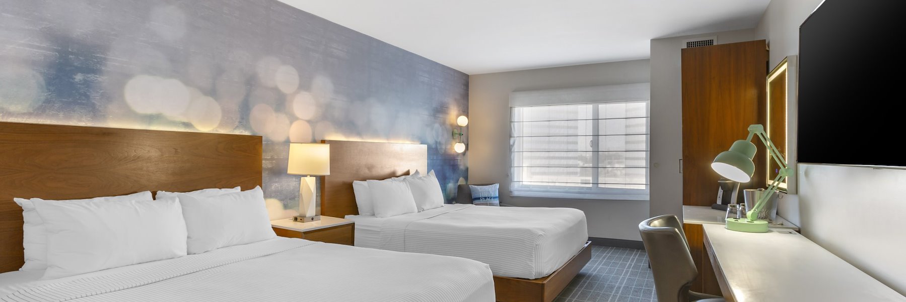 https://www.cambrialax.com/resourcefiles/main-image/two-queen-room-at-cambria-hotel-lax.jpg?version=11302023184705